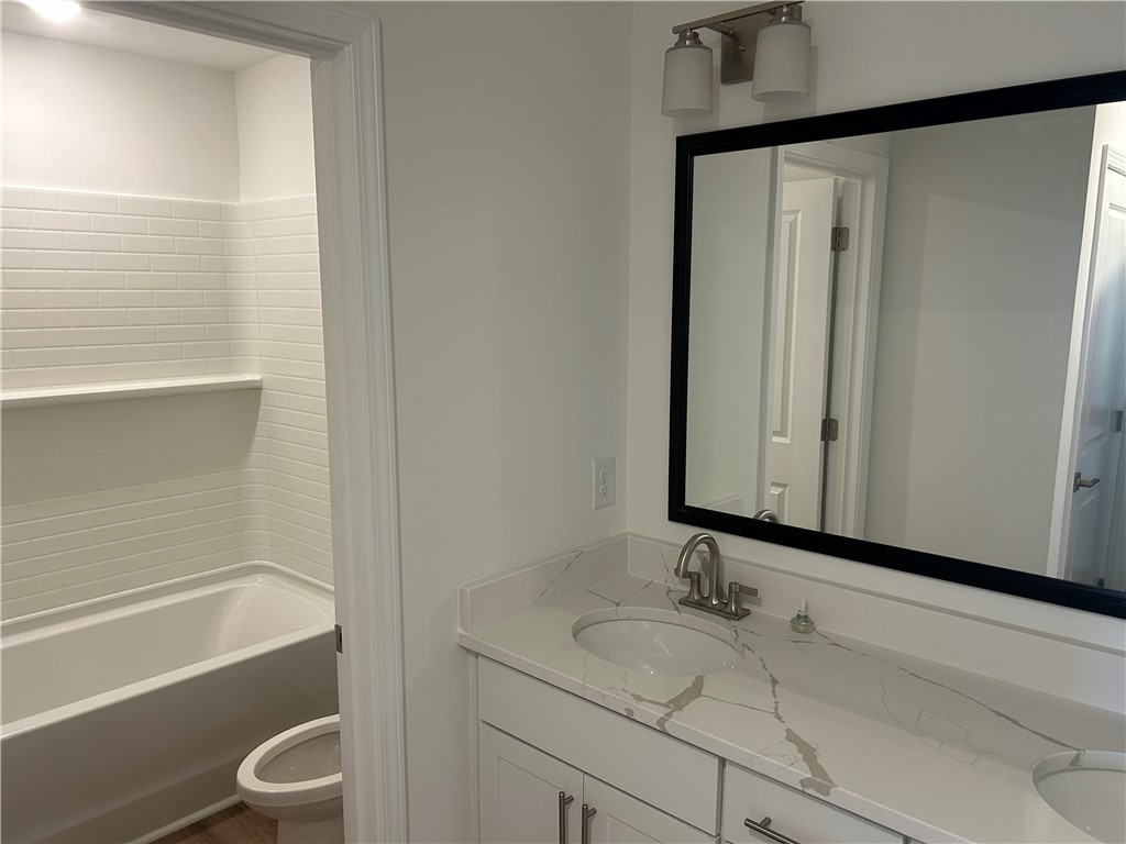 217 Bellflower Lane Anderson, SC 29625 - Photo 23 of 27 Double vanity with sleek countertops offers abundant space for daily routines.