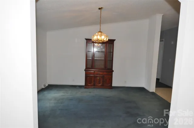 a view of a chandelier in big room