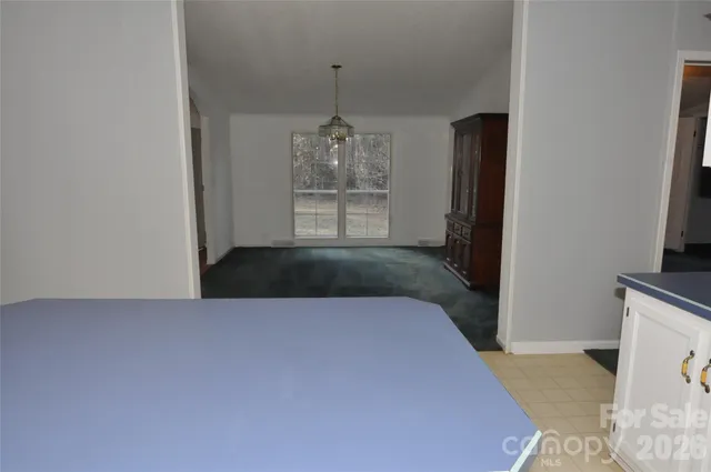 a view of a room with a staircase