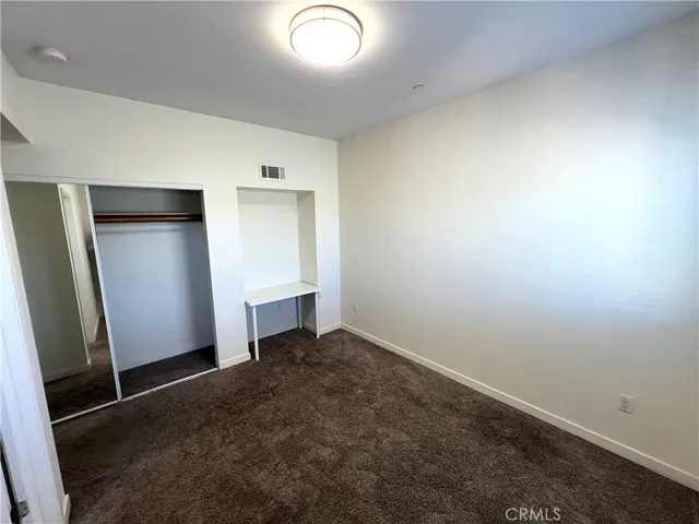 an empty room with closet