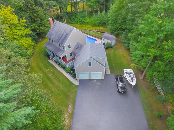 39 R Kimball Road Amesbury, MA 01913 - Photo 2 of 28 an aerial view of a house with outdoor space