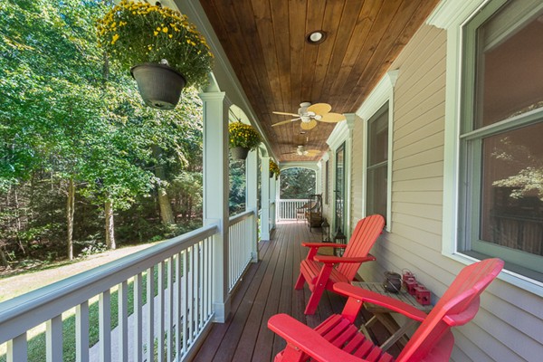 39 R Kimball Road Amesbury, MA 01913 - Photo 4 of 28 a balcony with wooden floor and furniture