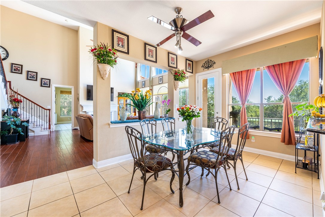 4325 Lago Viento Austin, TX 78734 - Photo 14 of 39 a view of a dining room with furniture window and outside view
