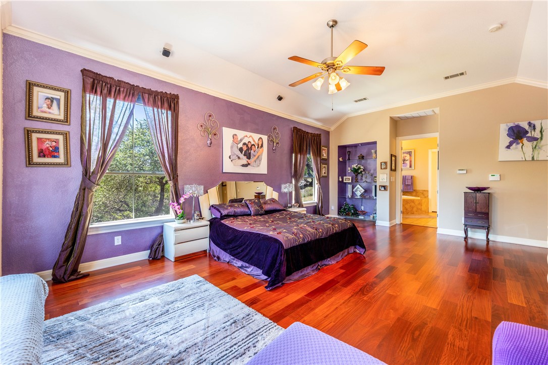 4325 Lago Viento Austin, TX 78734 - Photo 18 of 39 a living room with furniture and a large window