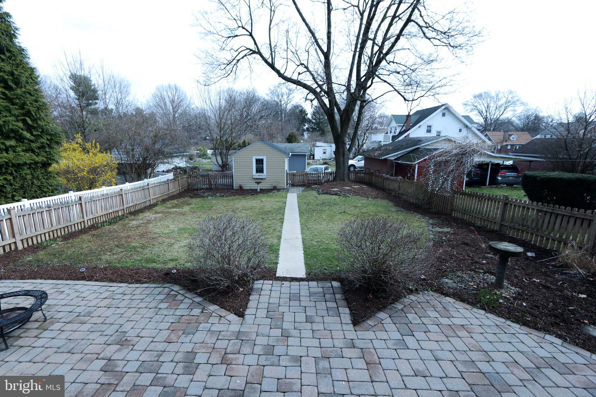 606 Pleasure Road Lancaster, PA 17601 - Photo 39 of 42 Rear fenced yard with garage and parking