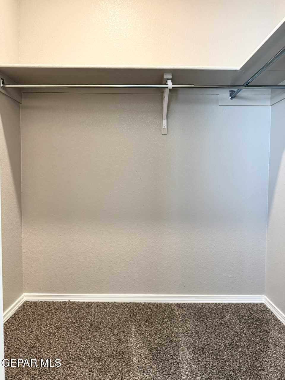 12409 Caddo Lane Clint, TX 79836 - Photo 5 of 13 a view of a room with shelf