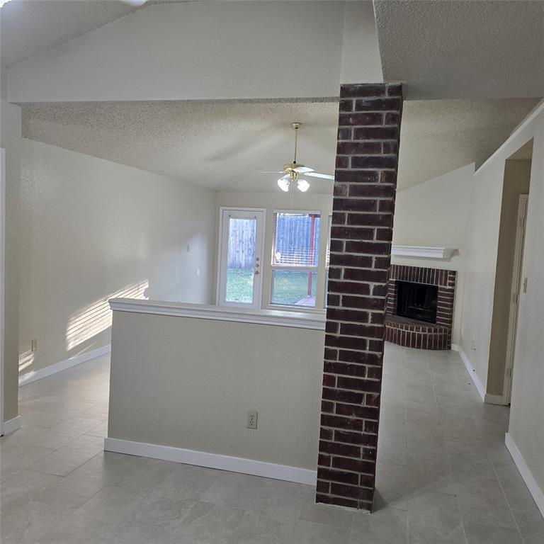 7905 Flowertree Court Fort Worth, TX 76137 - Photo 11 of 17 a view of livingroom and natural light