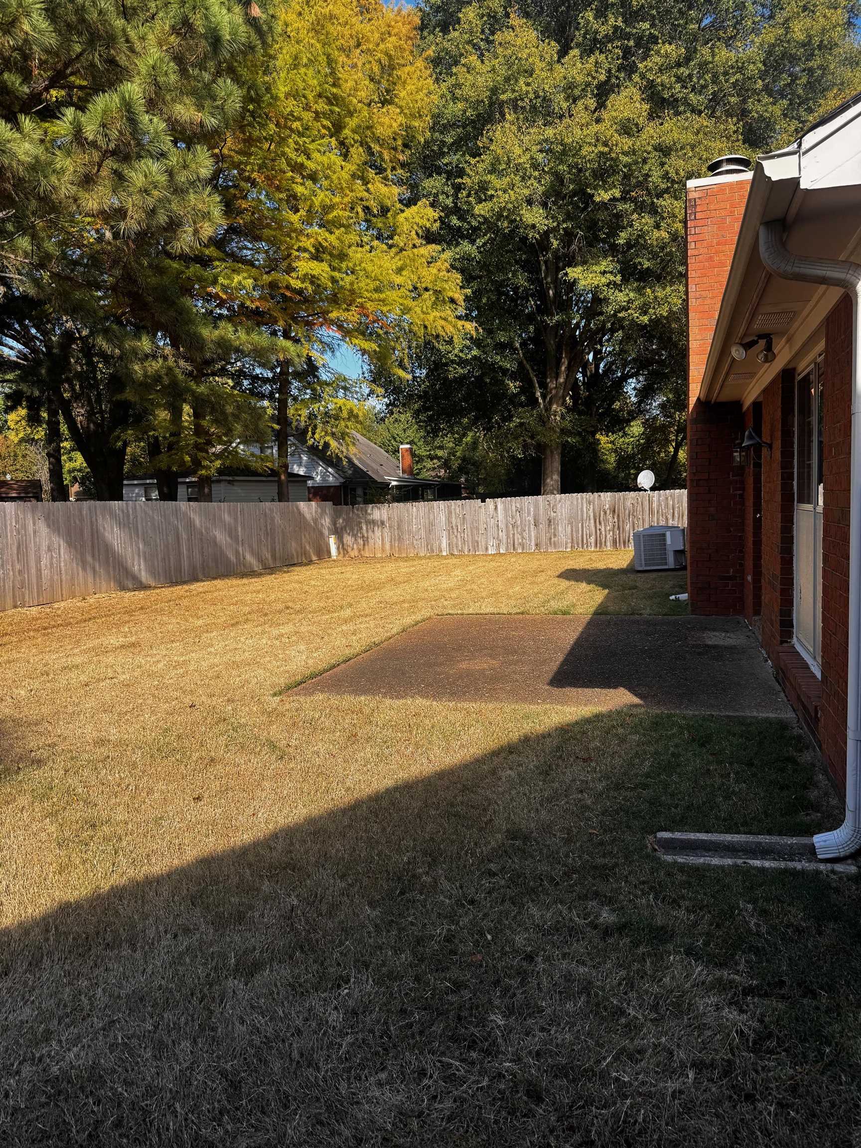 8460 Buckhurst Road Memphis, TN 38016 - Photo 18 of 19 a view of an outdoor space and yard