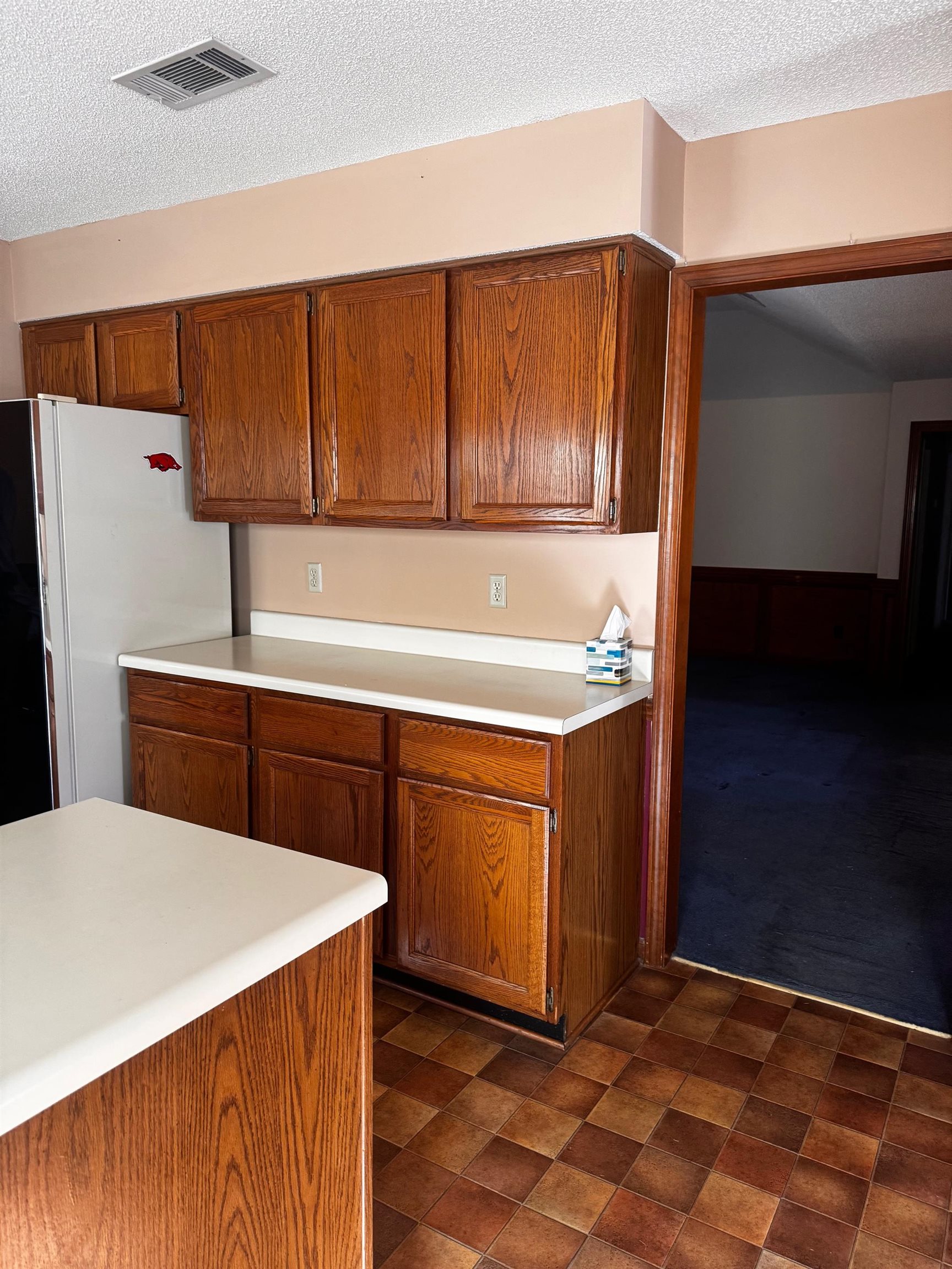 8460 Buckhurst Road Memphis, TN 38016 - Photo 7 of 19 a kitchen with stainless steel appliances a sink and a refrigerator