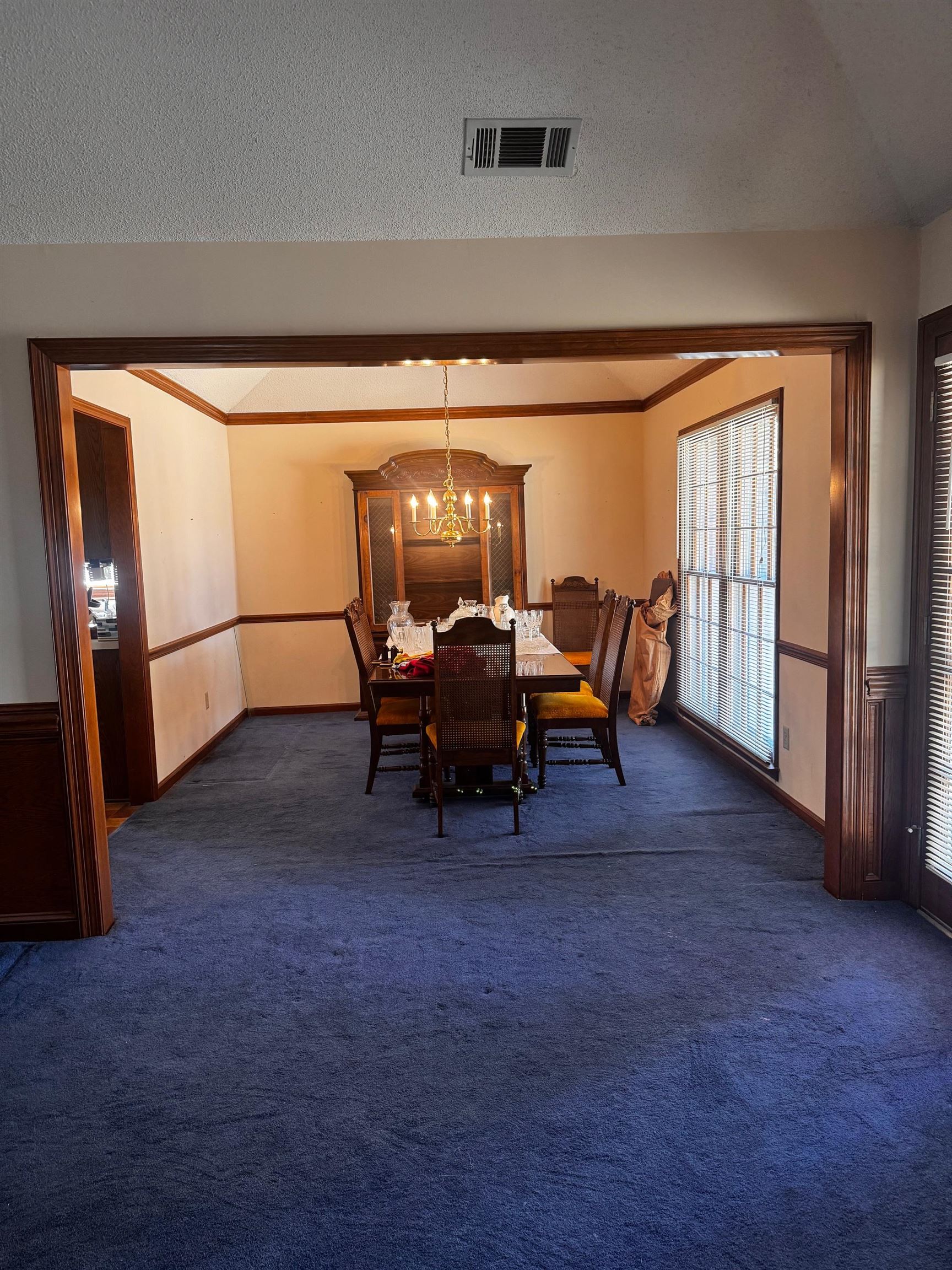8460 Buckhurst Road Memphis, TN 38016 - Photo 9 of 19 a view of a livingroom with furniture and a window