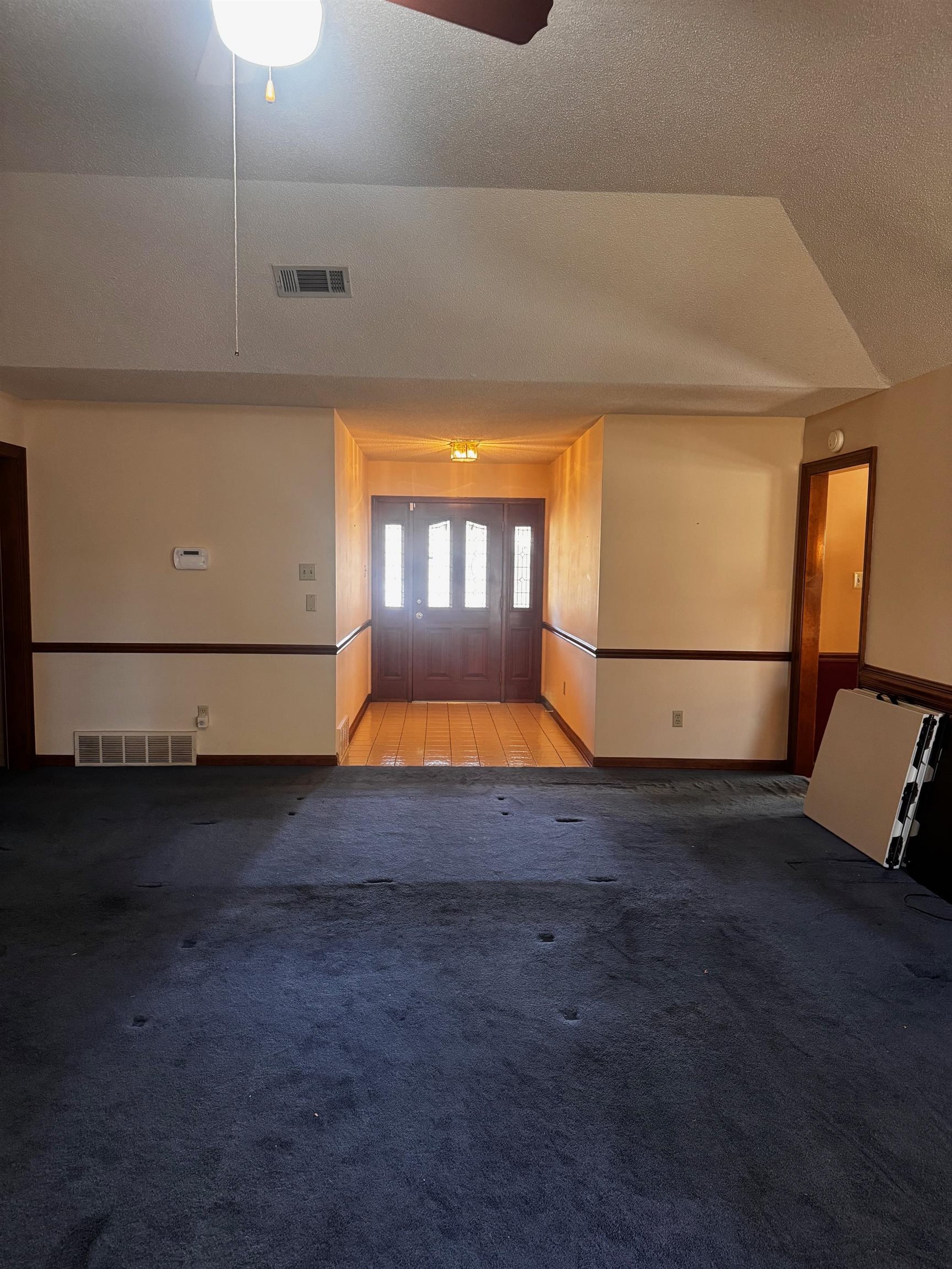 8460 Buckhurst Road Memphis, TN 38016 - Photo 10 of 19 a view of wooden floor and windows in the room