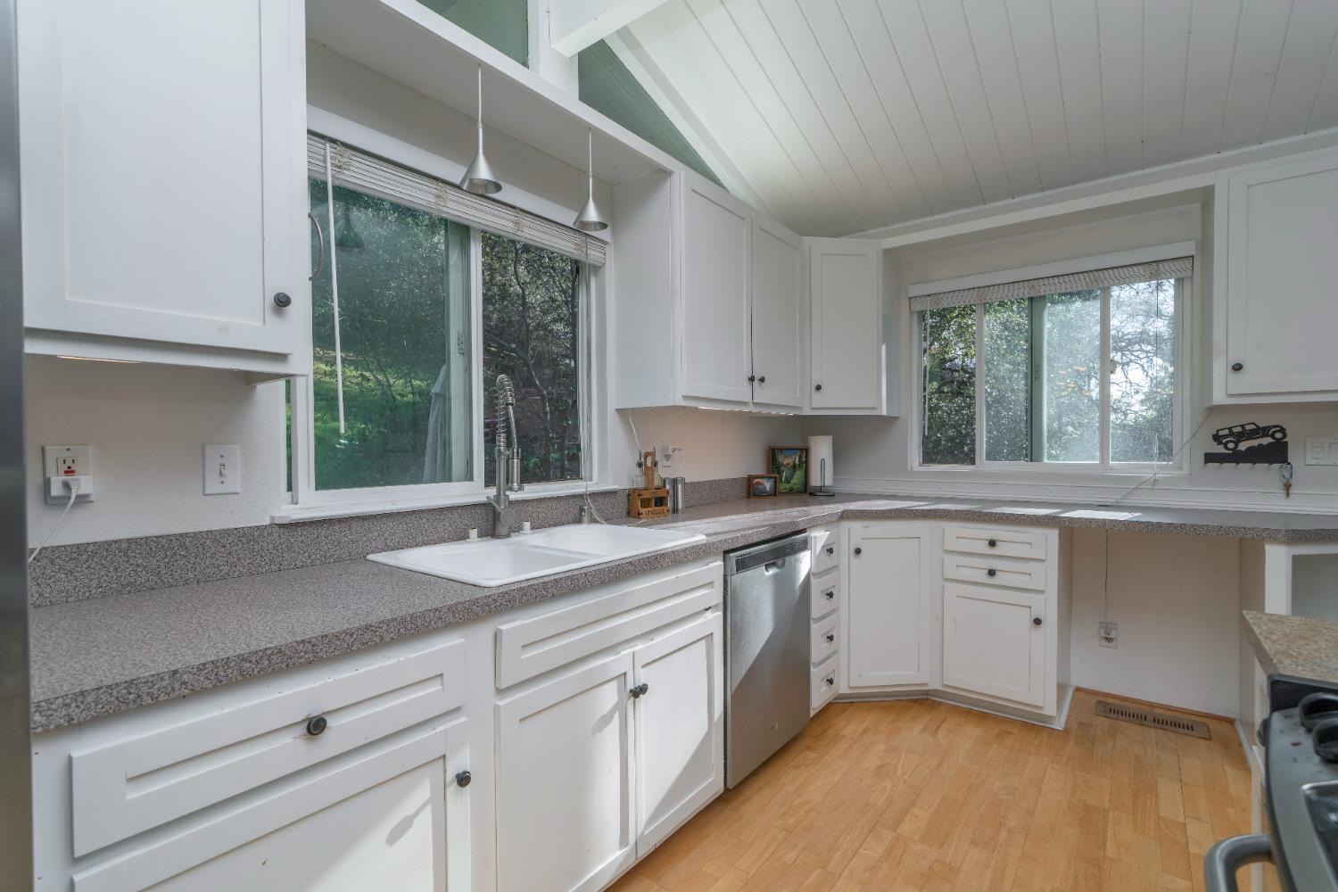 2869 Cascade Trail Cool, CA 95614 - Photo 14 of 80 a kitchen with a sink cabinets and window