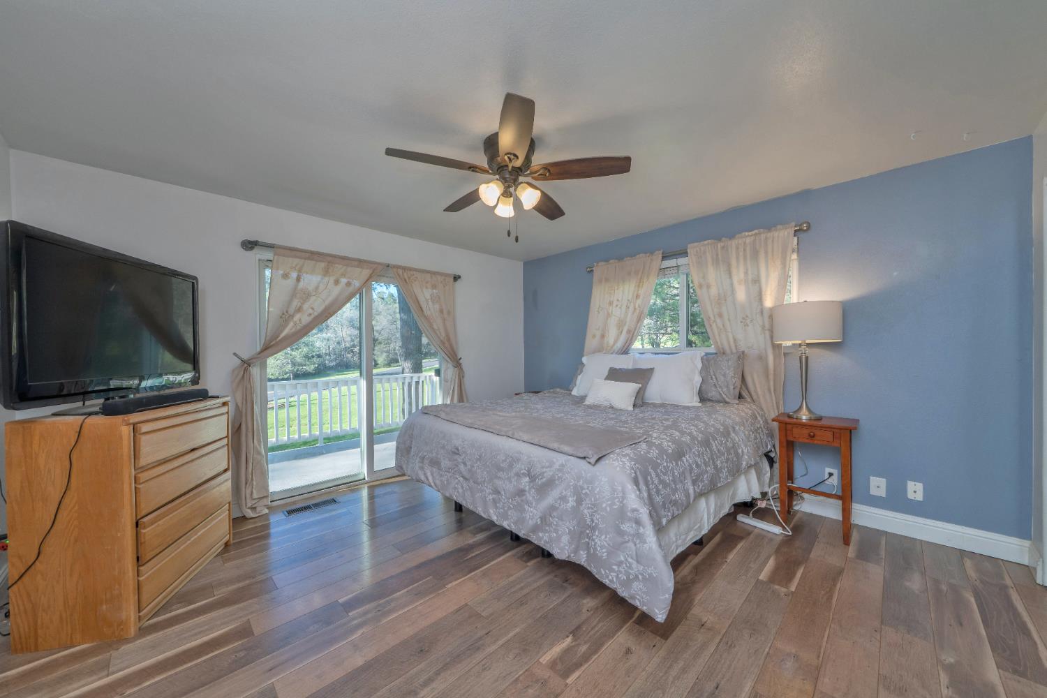 2869 Cascade Trail Cool, CA 95614 - Photo 21 of 80 a bedroom with a bed and a flat screen tv