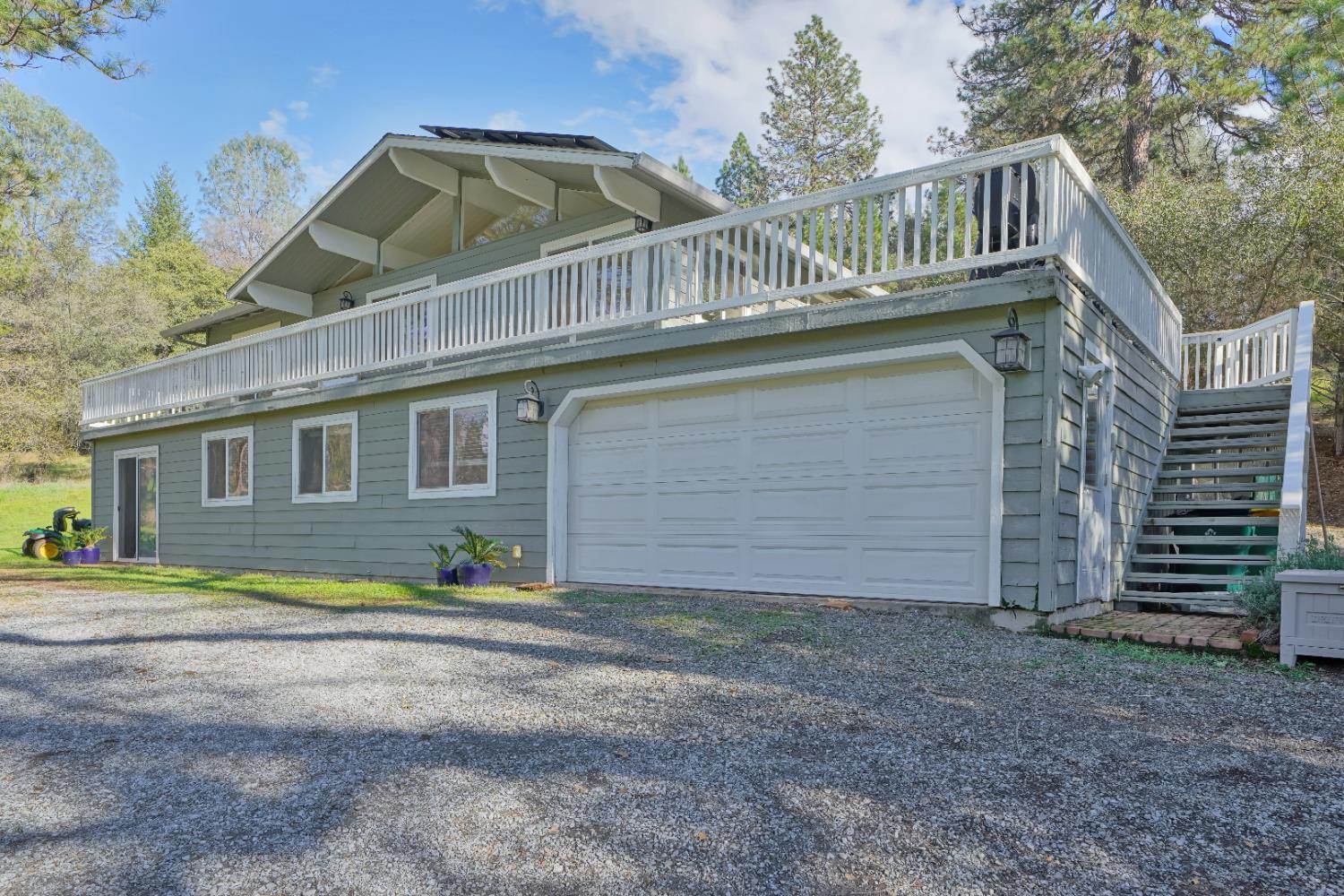 2869 Cascade Trail Cool, CA 95614 - Photo 55 of 80 a front view of a house with a yard
