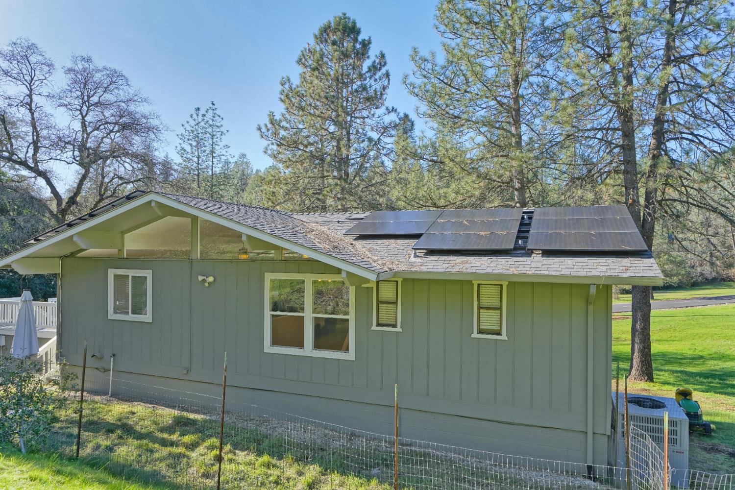 2869 Cascade Trail Cool, CA 95614 - Photo 70 of 80 a view of a house with a yard