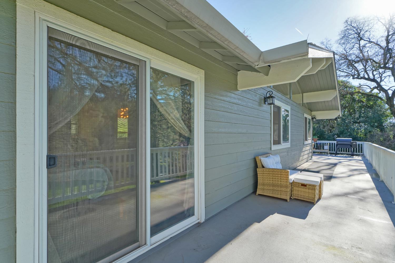 2869 Cascade Trail Cool, CA 95614 - Photo 78 of 80 a view of a room with wooden floor and a potted plant