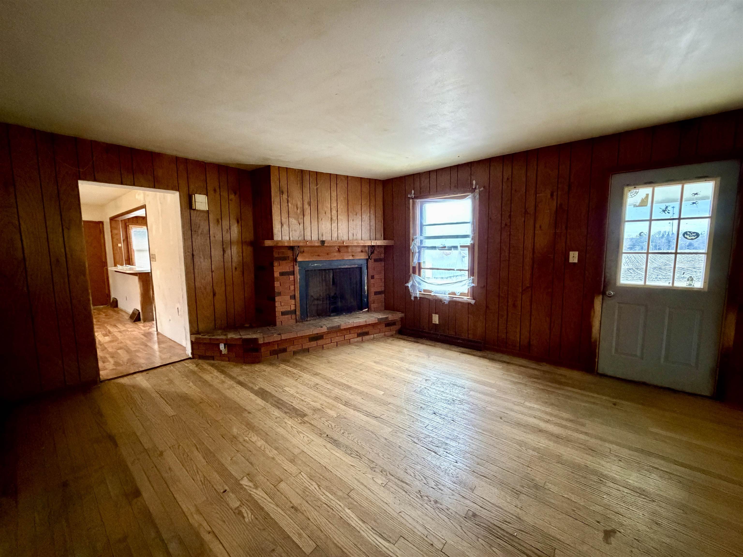 3517 North Henderson Road Freeport, IL 61032 - Photo 15 of 26 an empty room with windows and fireplace