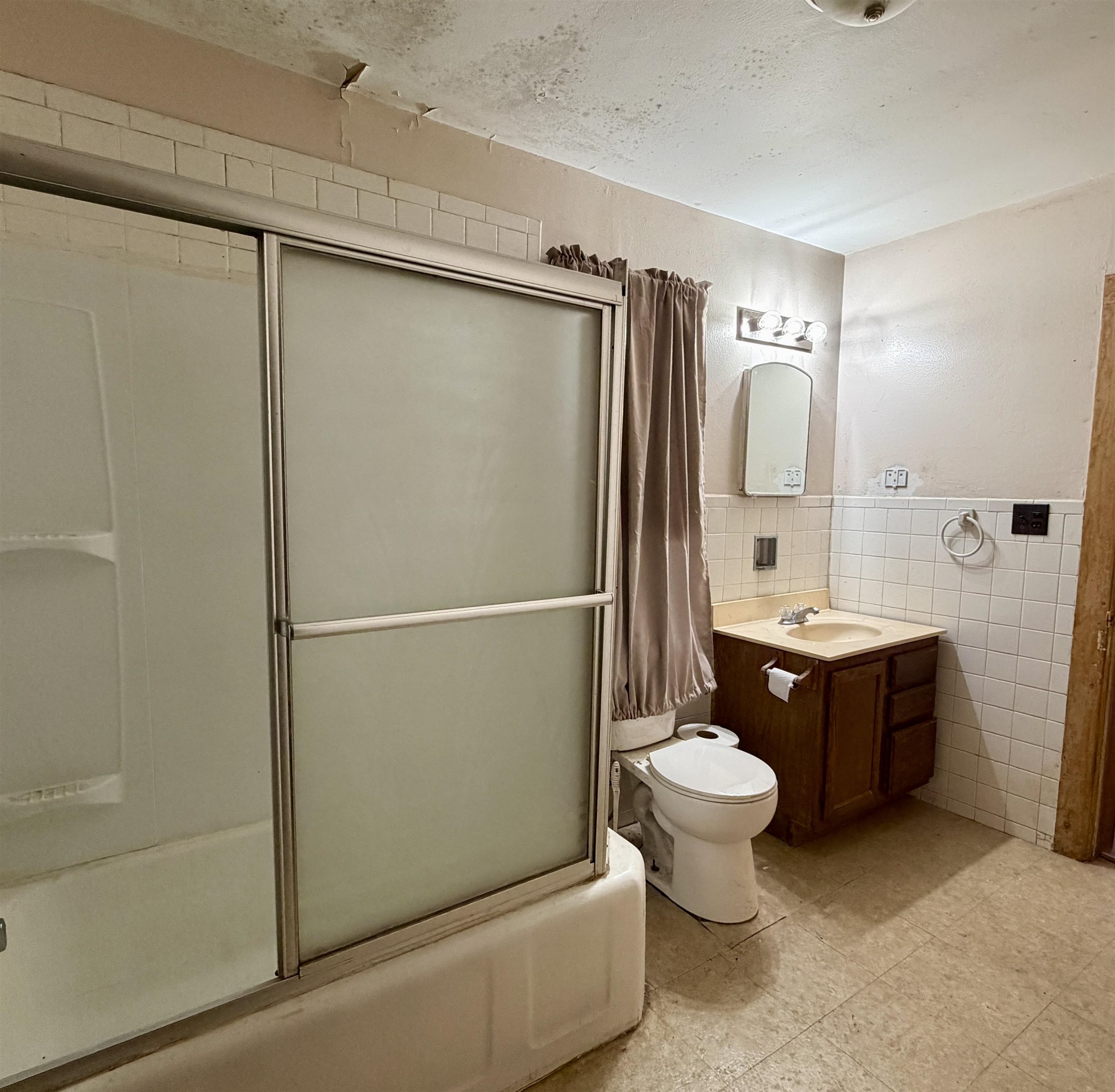 3517 North Henderson Road Freeport, IL 61032 - Photo 16 of 26 a bathroom with a granite countertop toilet sink and mirror