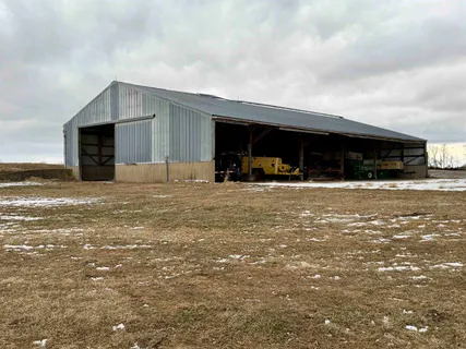 a view of a kitchen with a sink cabinets and wooden floor