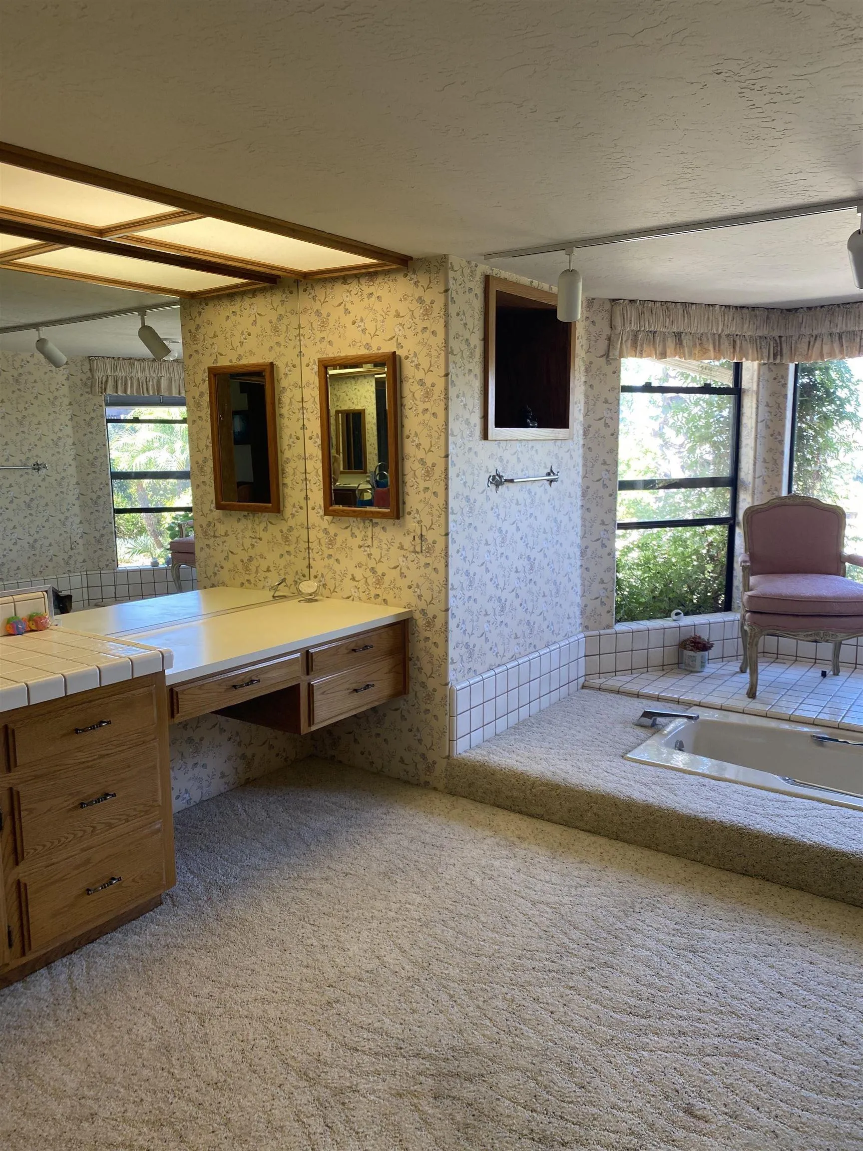1335 Sunny Heights Road Fallbrook, CA 92028 - Photo 3 of 9 a spacious bathroom with a double vanity sink a mirror and a bathtub