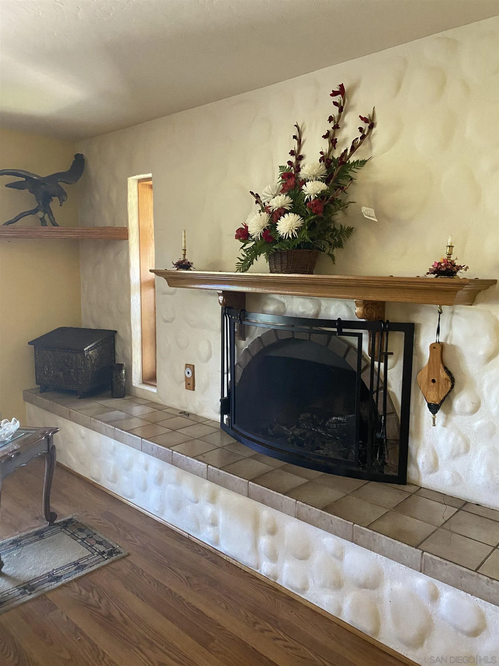 1335 Sunny Heights Road Fallbrook, CA 92028 - Photo 9 of 9 a living room with furniture and a fireplace