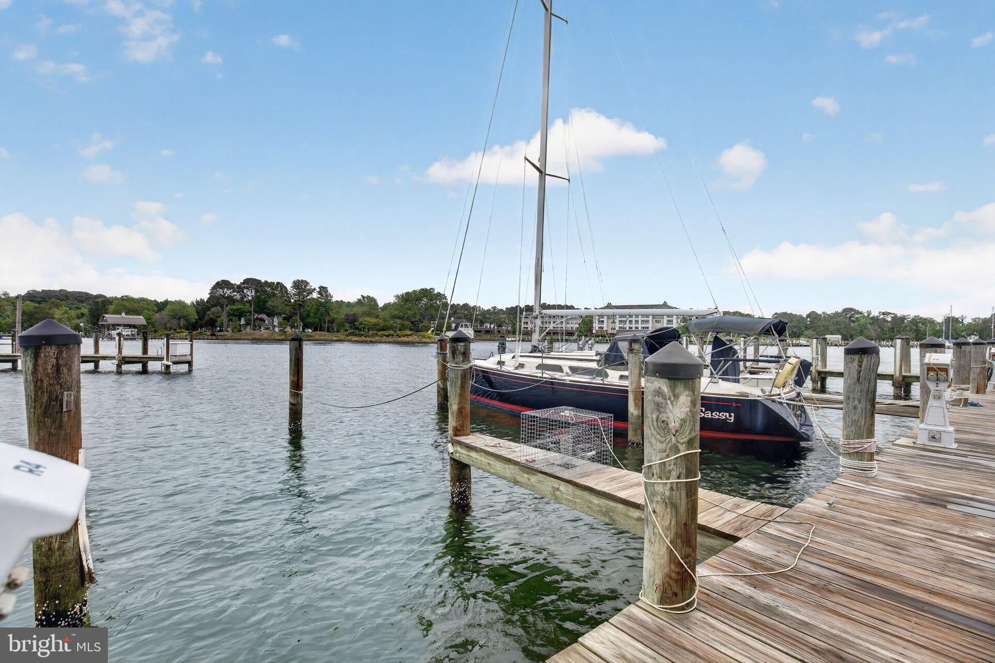 733 Runabout Loop, Unit 733 Solomons, MD 20688 - Photo 36 of 50 Boat slip in marina in front of building
