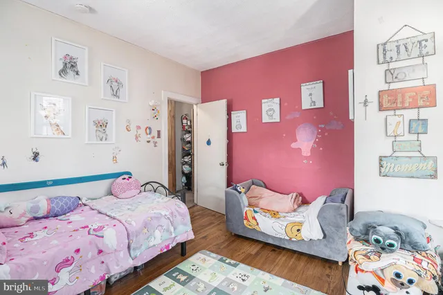 a bedroom with a bed and a bed