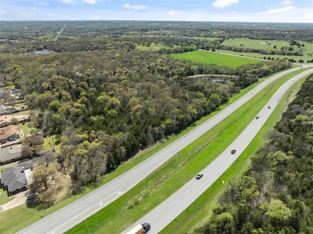 a view of a lush green field