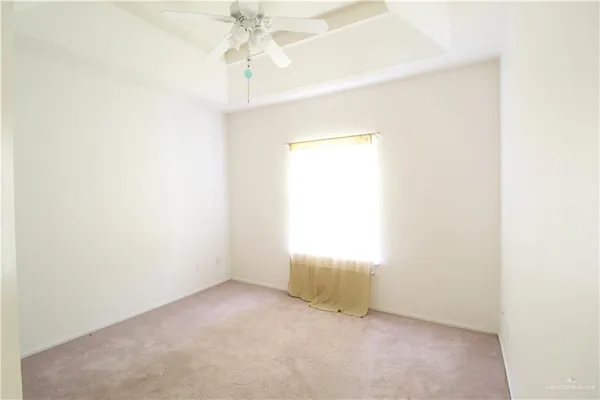 a bathroom with a shower and a sink