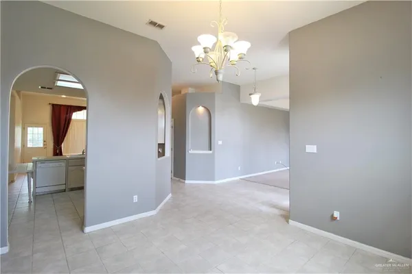 a kitchen with a sink stove and microwave