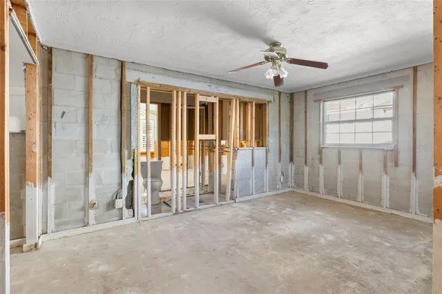 an empty room with windows