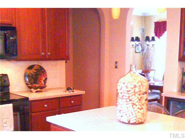 8620 Royton Circle Raleigh, NC 27613 - Photo 7 of 25 Another view of the kitchen which features wood floors Kitchen