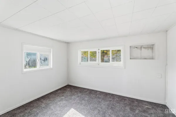 a view of a room with an empty space