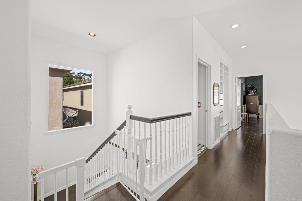 120 Venetia Way Oceanside, CA 92057 - Photo 11 of 32 a view of a hallway with windows and stairs
