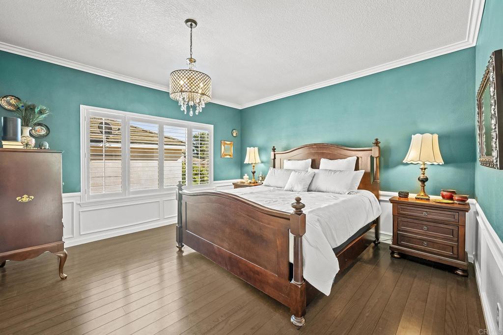 120 Venetia Way Oceanside, CA 92057 - Photo 13 of 32 a bedroom with a bed and a window