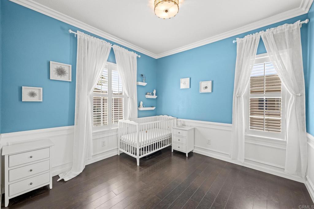 120 Venetia Way Oceanside, CA 92057 - Photo 18 of 32 a spacious bedroom with a bed and a window