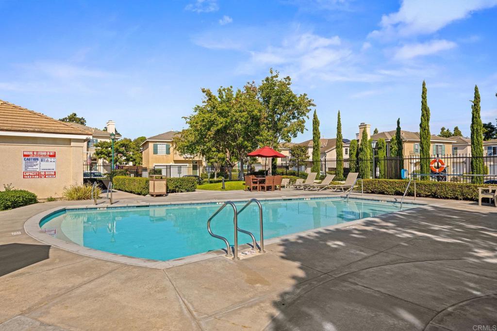 120 Venetia Way Oceanside, CA 92057 - Photo 27 of 32 a view of swimming pool with outdoor seating and city view