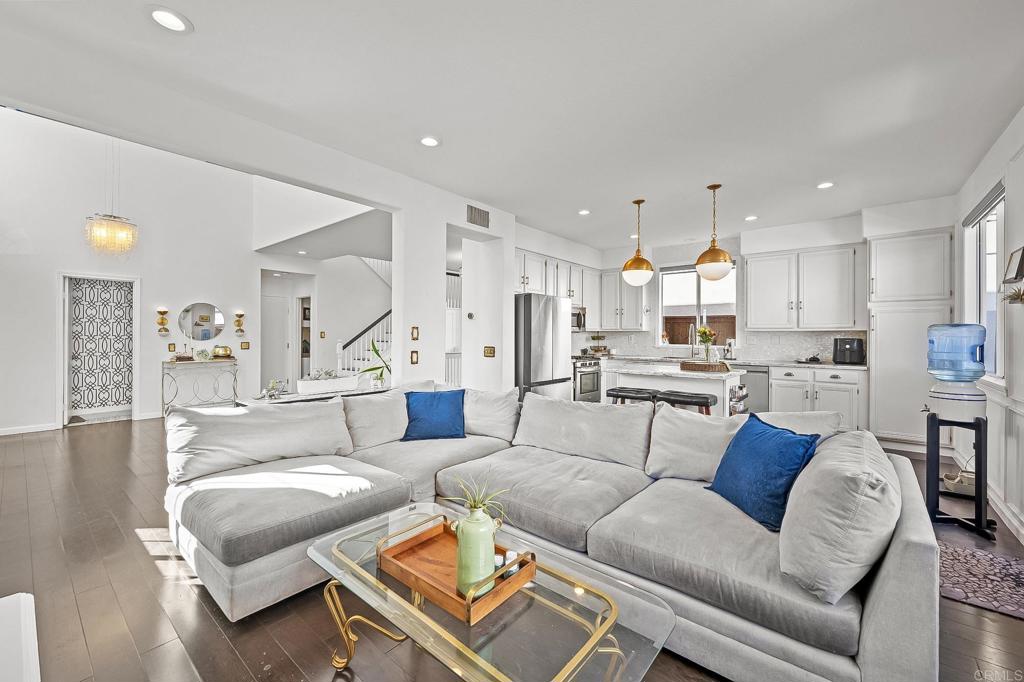 120 Venetia Way Oceanside, CA 92057 - Photo 6 of 32 a living room with furniture and kitchen view