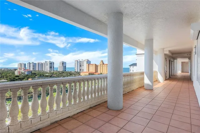 a view of a balcony with city view