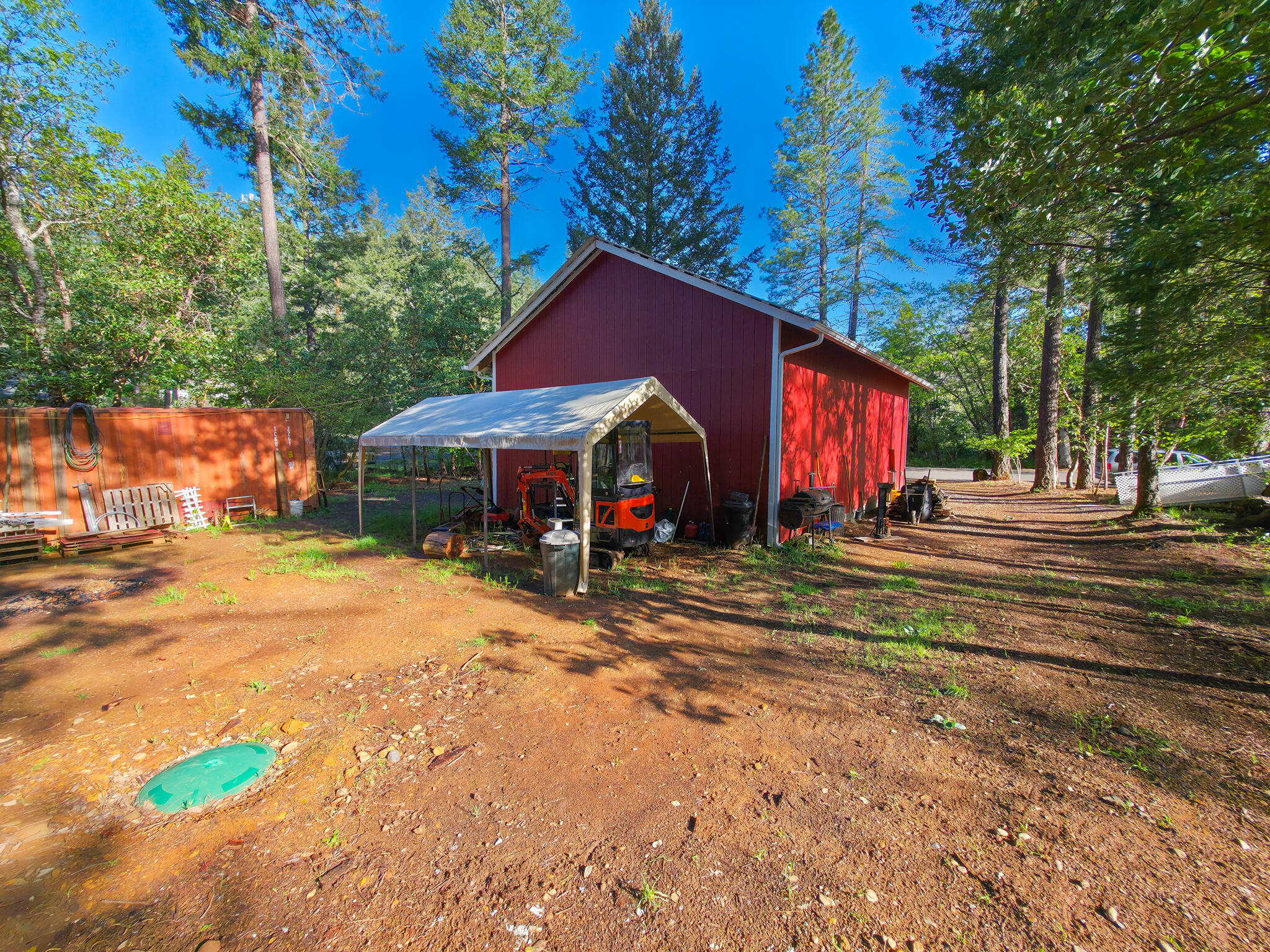 451 Stage Stop Drive Cave Junction, OR 97523 - Photo 25 of 31 green lid is septic and awning cover for equipment