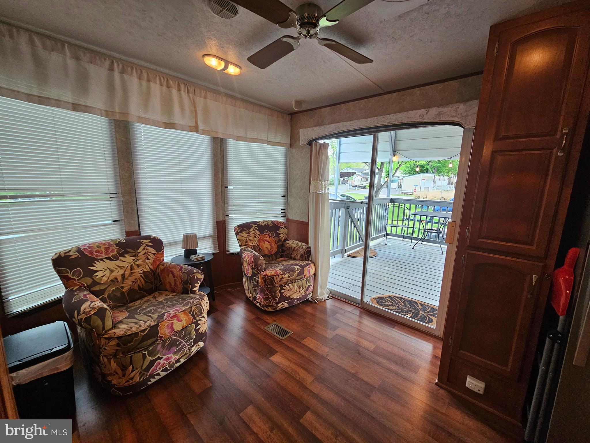 8 Cindy Avenue Falling Waters, WV 25419 - Photo 15 of 32 a living room with furniture and a large window
