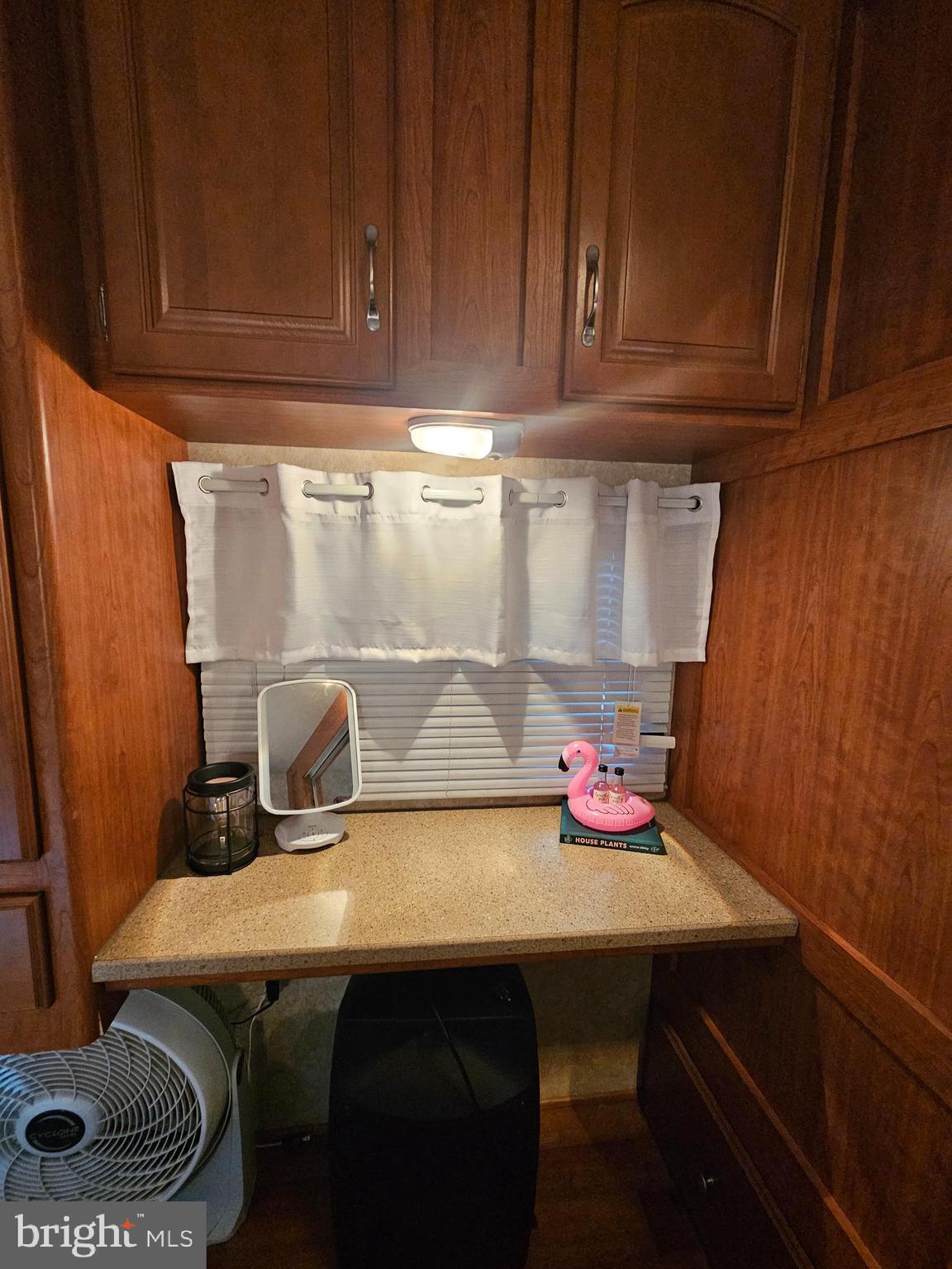 8 Cindy Avenue Falling Waters, WV 25419 - Photo 19 of 32 a kitchen with a table chairs and cabinets