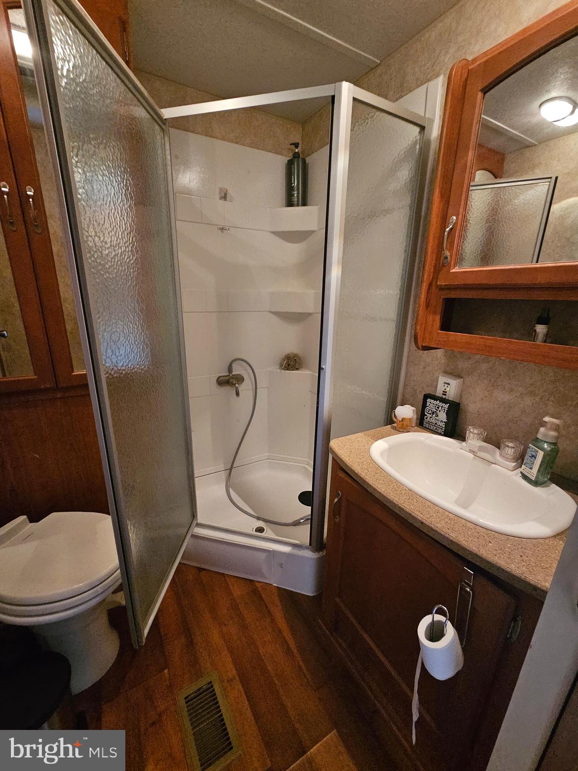 8 Cindy Avenue Falling Waters, WV 25419 - Photo 21 of 32 a bathroom with a sink toilet and shower