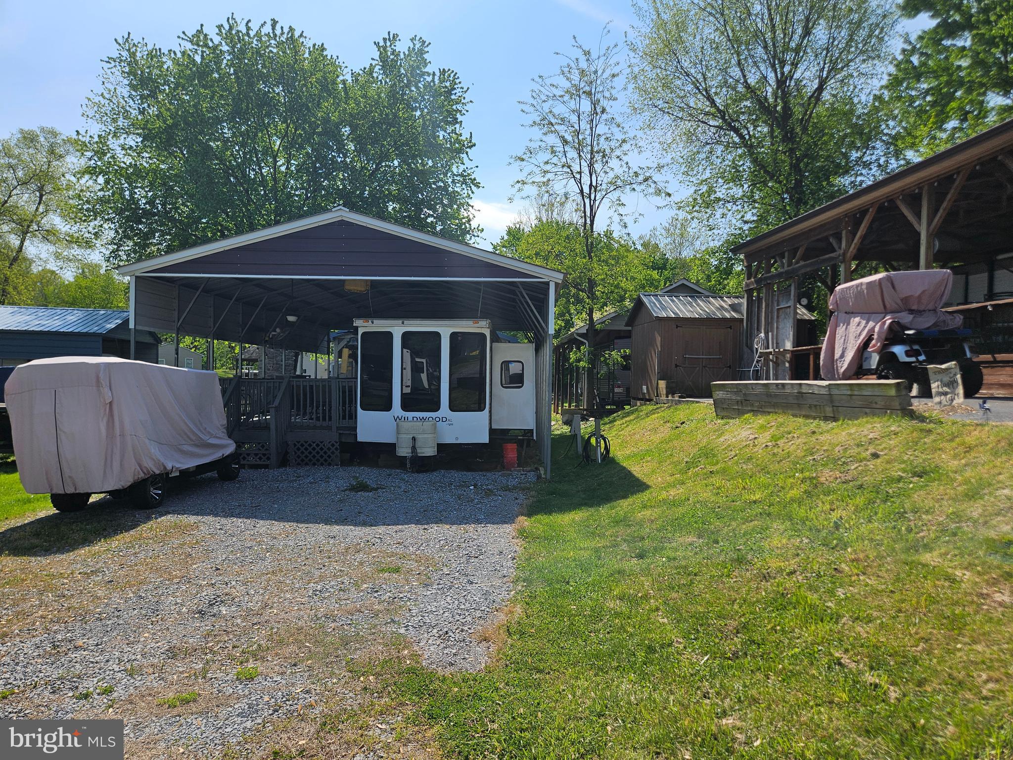 8 Cindy Avenue Falling Waters, WV 25419 - Photo 3 of 32 a view of a house with backyard and sitting area