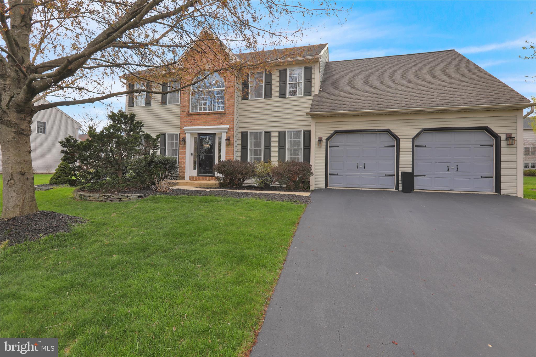 18 Colorado Avenue Reading, PA 19608 - Photo 1 of 37 a front view of a house with garden