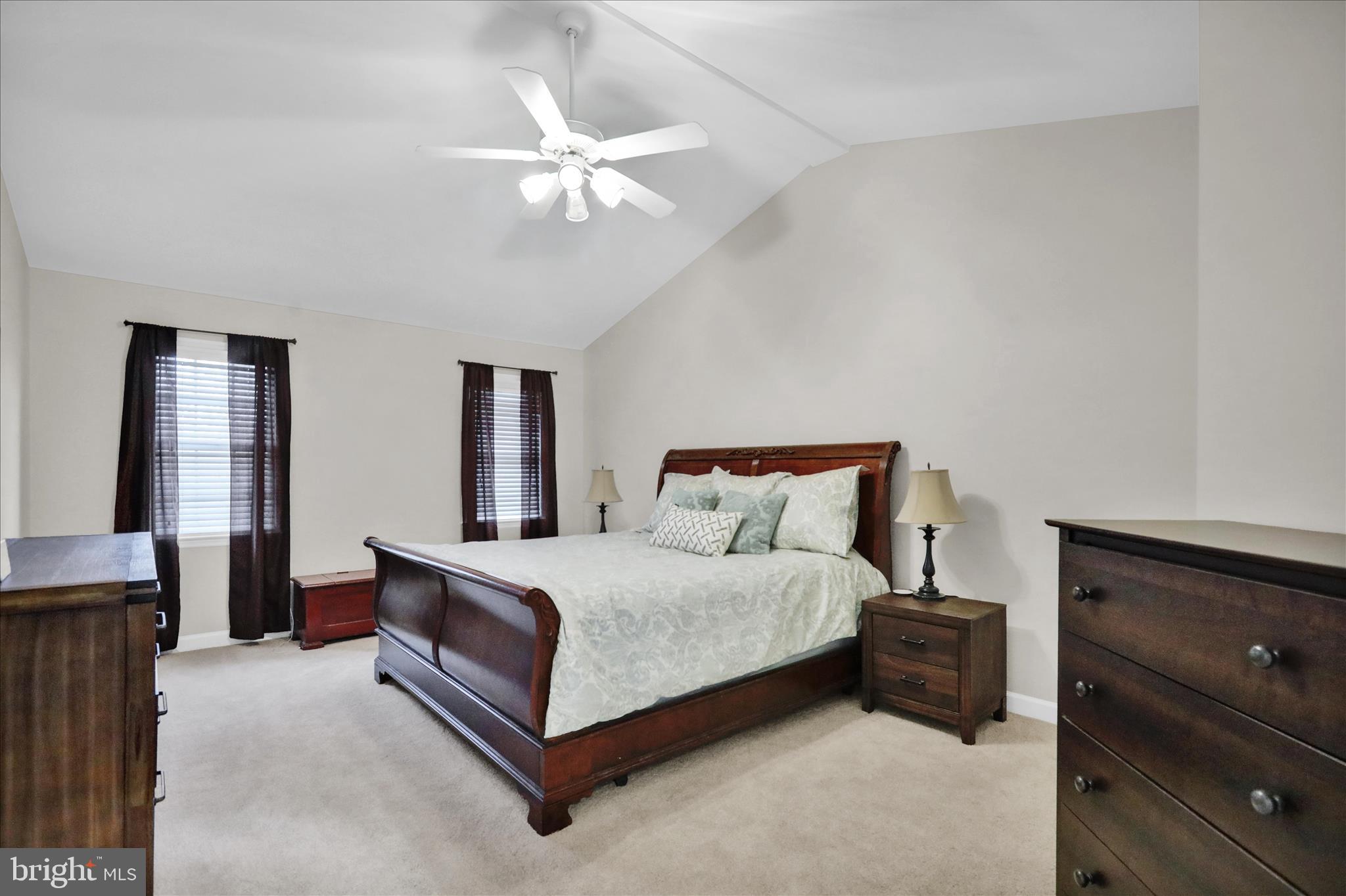 18 Colorado Avenue Reading, PA 19608 - Photo 19 of 37 a bedroom with a bed lamp and dresser