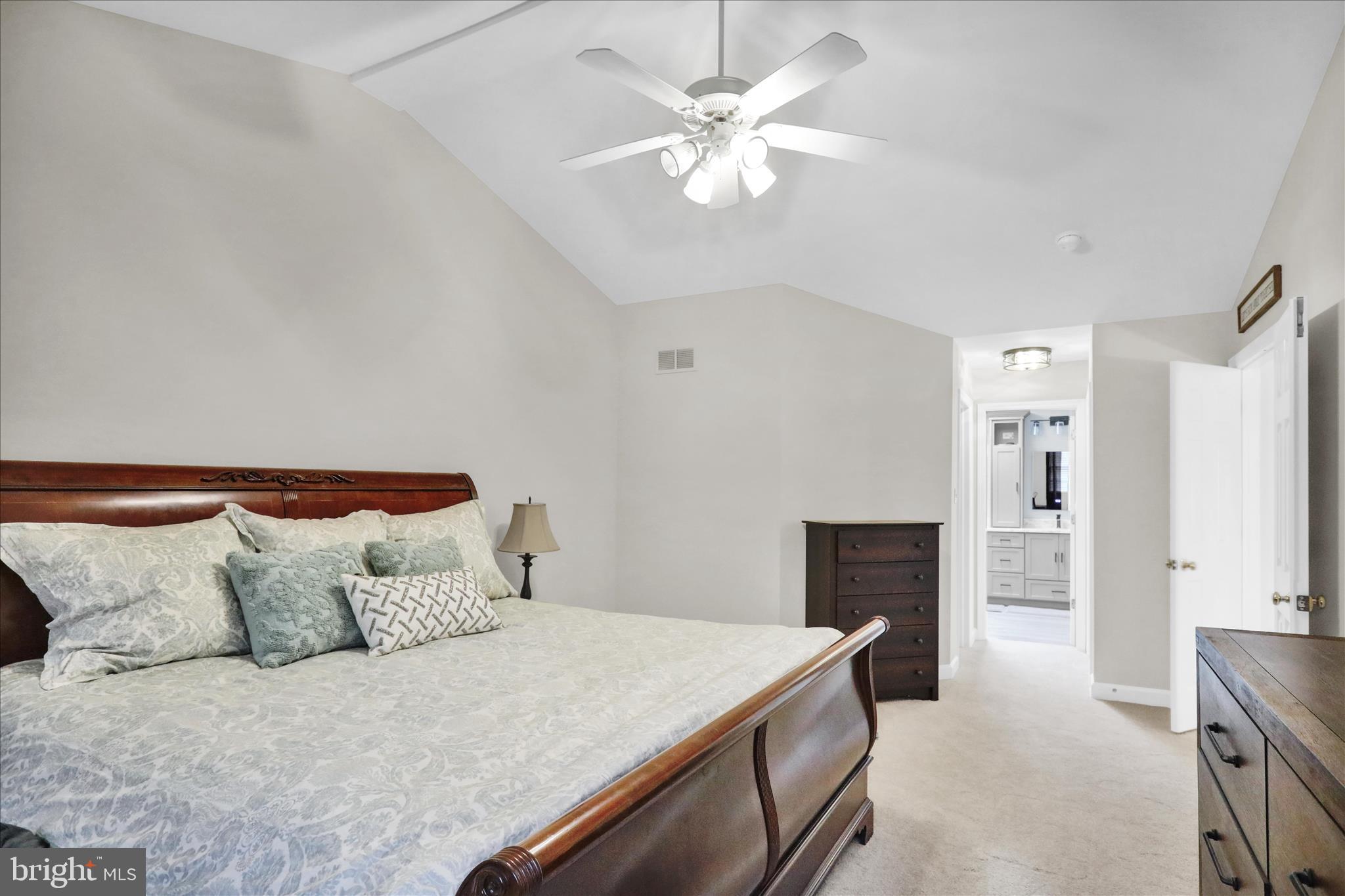 18 Colorado Avenue Reading, PA 19608 - Photo 20 of 37 a bedroom with a bed and a chandelier