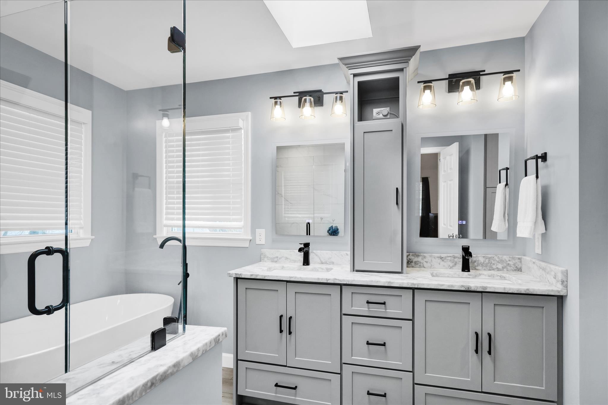 18 Colorado Avenue Reading, PA 19608 - Photo 21 of 37 a bathroom with a double vanity sink mirror and bathtub
