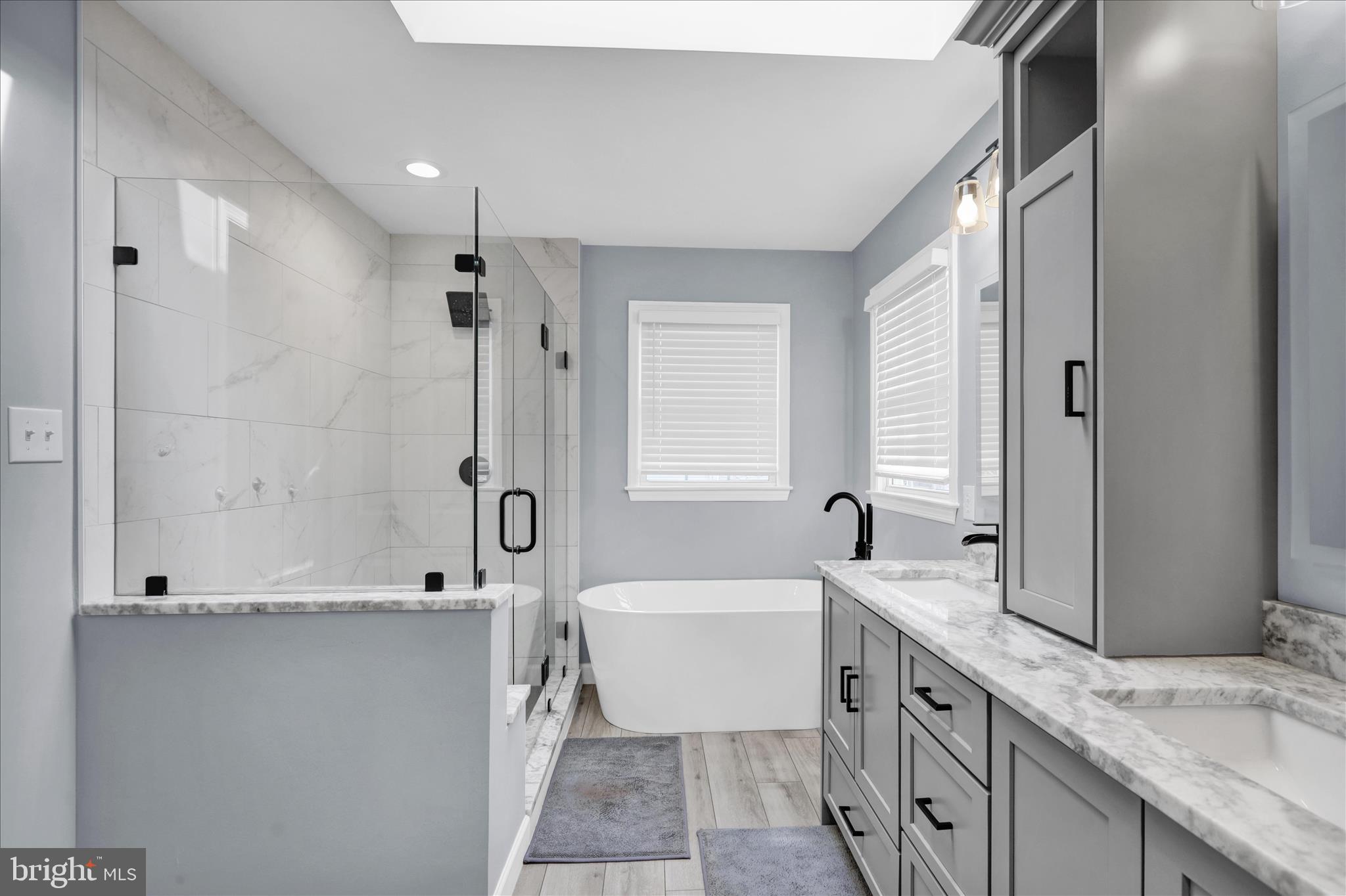 18 Colorado Avenue Reading, PA 19608 - Photo 22 of 37 a bathroom with a granite countertop sink mirror and a bathtub