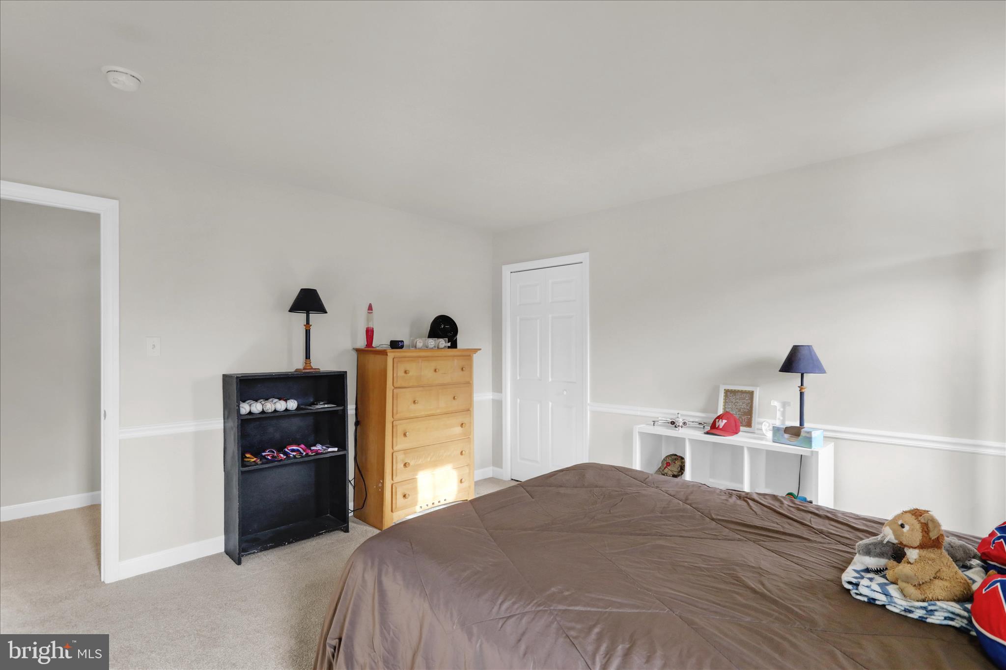 18 Colorado Avenue Reading, PA 19608 - Photo 25 of 37 a bedroom with a bed and a closet